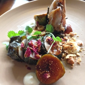 Vine leaf bound quail, almonds and rose, caramelized fig and smoked curd