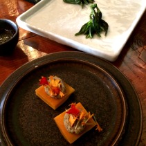 Warrigal greens with vinaigrette powder and lightly pickled pumpkin skins with nut cheese and marigold