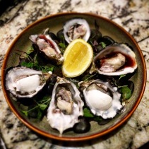 Smoky Bay oysters - natural, lemon sorbet and vinaigrette